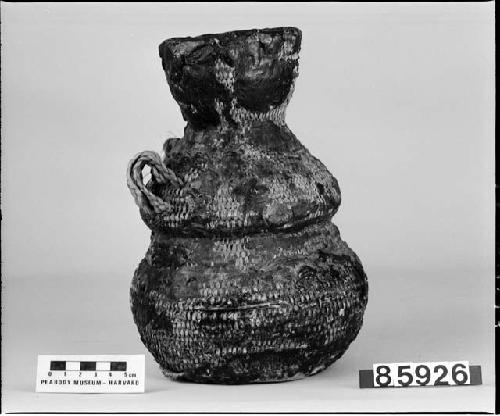Water jar, pitched, from unknown collection. Coiled.