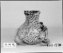 Water jar, pitched, from the collection of T.L. Bolton. Coiled.