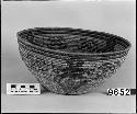 Basket bowl made of cord, from the collection of A.E. White. Coiled.