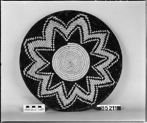 Tray from the collection of C.C. Willoughby. Coiled, three-rod foundation, non-interlocking stitches.