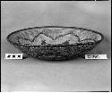 Tray from the collection of C. Hartman. Coiled, three-rod foundation, non-interlocking stitches.