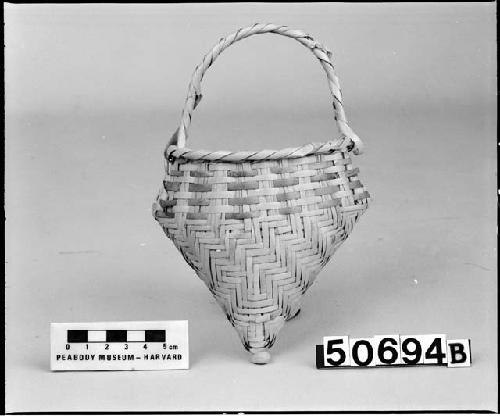 Heart-shaped or "cownose" basket. From the collection of the New Orleans Exposition, 1884. Twill plaited.