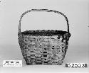 Carrying basket. From the collection of F. Reid and/or W.T. Coatsworth, probably pre-1940. Plain plaited.