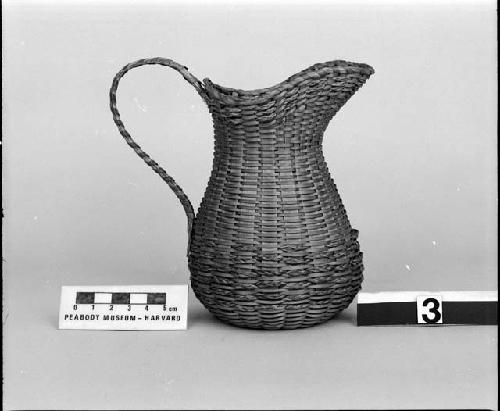 Pitcher. From the collection of the brothers of Mrs. J.M. Robinson, 1883-1925. Plain plaited.