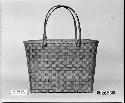 Carrying basket. From the collection of the brothers of Mrs. J.M. Robinson, 1883-1925. Plain plaited.