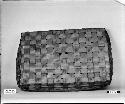 Rectangular basket cover. From unknown collection. Plain plaited.