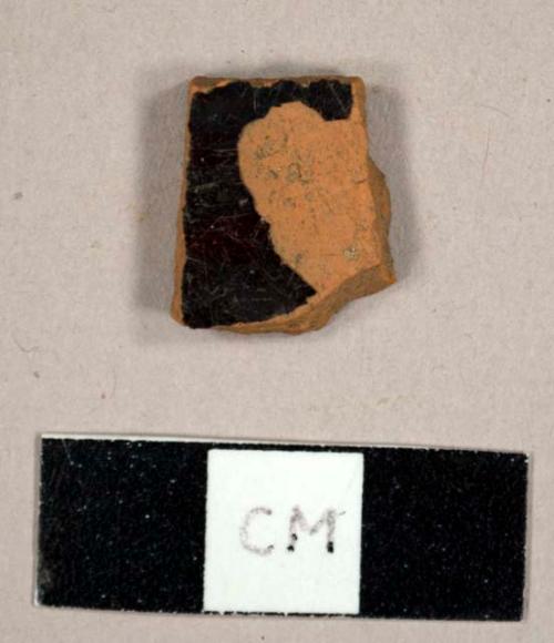Refined redware with black glaze on interior and exterior, possibly buckly-ware type