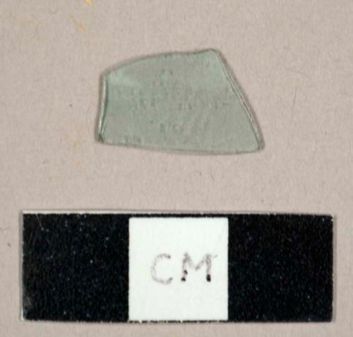 Aqua curved glass fragment, possibly from a hurricane lamp