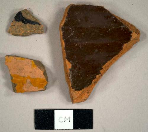 Brown and black lead glazed refined red earthenware sherds