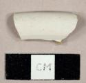 White salt-glazed stoneware sherd, possibly a folded rim to a mug or small bowl