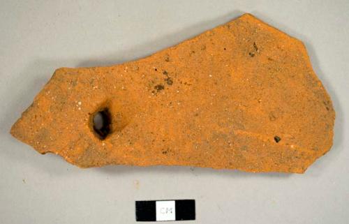 Brick roof tile fragment with nail hole