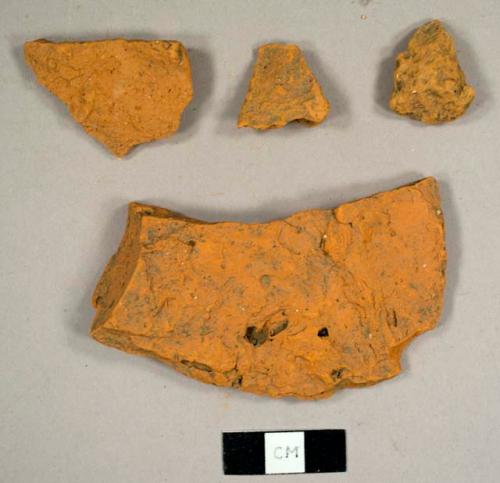 Brick fragments, including some possible roof tiles and redware bits