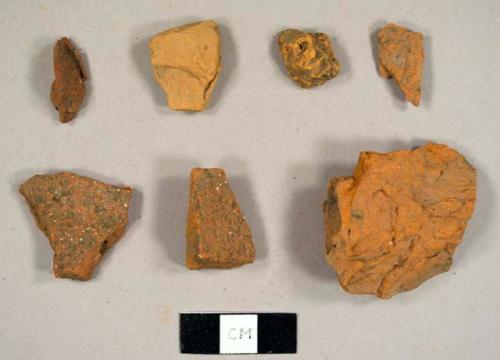 Brick fragments, including one possible unglazed redward sherd