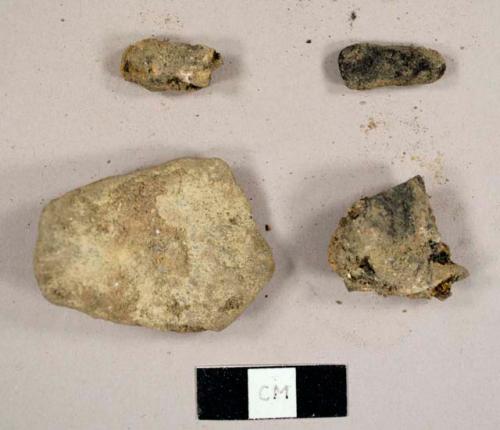 Miscellaneous fragments, including stone and charcoal