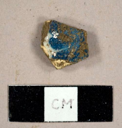 Tin-glazed earthenware sherd with blue on white hand painted design