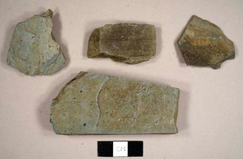 Slate fragments, including at least one cut fragment