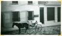 Scan of photograph from Judge Burt Cosgrove photo album.Milk wagon