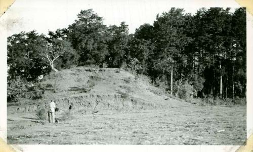 Scan of photograph from Judge Burt Cosgrove photo album.mound on edge of Guatemala City