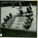Scan of photograph from Judge Burt Cosgrove photo album."Image" surrounded by "Romans"