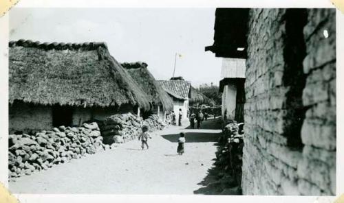 Scan of photograph from Judge Burt Cosgrove photo album.Street in San Pedro