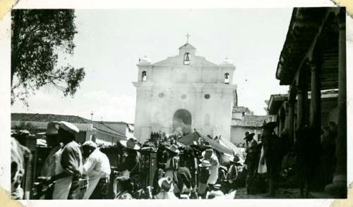 Scan of photograph from Judge Burt Cosgrove photo album.Church of Santo Toma's-Chichicastenango Father Rossbach's church-Incense smoke coming out of the door.