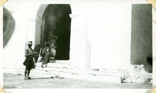 Scan of photograph from Judge Burt Cosgrove photo album.Entrance to the Calvario-Opposite side of the plaza from the Church of Santo Toma's