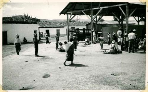 Scan of photograph from Judge Burt Cosgrove photo album.Market place San Ramundo