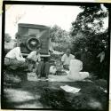 Scan of photograph from Judge Burt Cosgrove photo album. Picnic in middle of road on way to San Jose