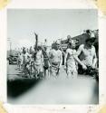 Scan of photograph from Judge Burt Cosgrove photo album. Mud dances