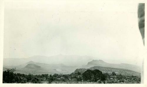 Scan of photograph from Judge Burt Cosgrove photo album.Doolittle Ranch, Mimbres Valley and Cookes Peak, Grant Co., New Mex