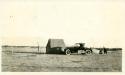 Scan of photograph from Judge Burt Cosgrove photo album.  Camp at Pueblo ruin north of El Paso Apr. 1924
