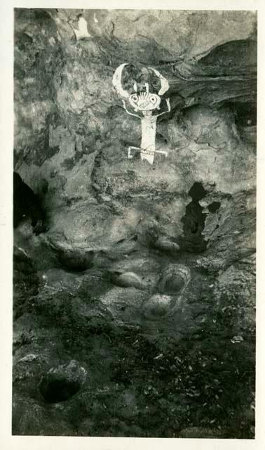 Scan of photograph from Judge Burt Cosgrove photo album.Milling Hole Petroglyph, Huecos Depressions worn in rock by sharpening stone axes.