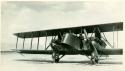 Scan of photograph from Judge Burt Cosgrove photo album. Martin Bomber in which trip was made. Plane dismantled and shipped to Hawaii.