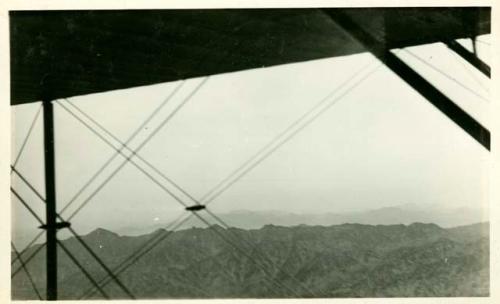 Scan of photograph from Judge Burt Cosgrove photo album.Mountains around Yuma