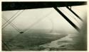 Scan of photograph from Judge Burt Cosgrove photo album. Southern Pacific R.R. bridge over Colorado River at Yuma