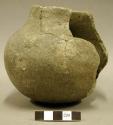 Ceramic vessel, plain, short neck, missing body & rim sherds