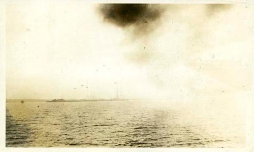 Scan of photograph from Judge Burt Cosgrove photo album. Wireless Towers and Aeroplanes-Annapolis June 1926