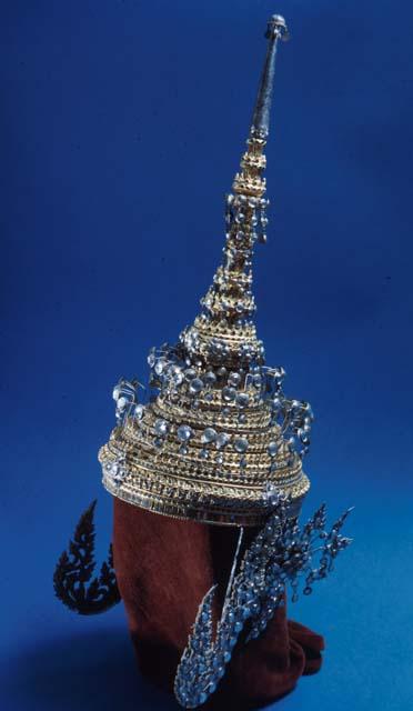 Jewelled headdress - topped with tall and finely pointed spire