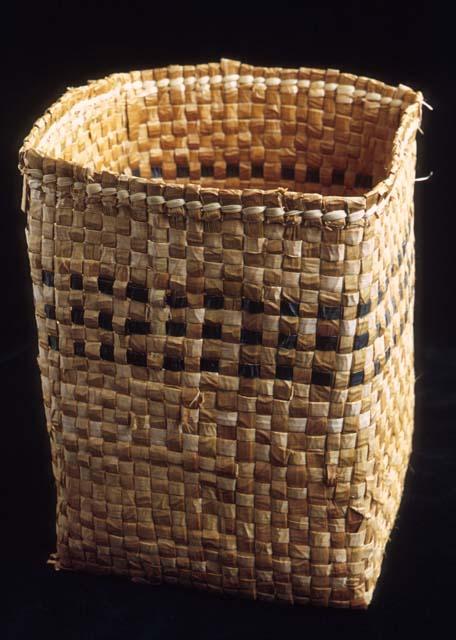 Rectangular open cedar bark basket, checkerwork.