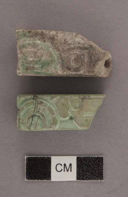 Three fragments of carved jade tubular beads (reused carving)