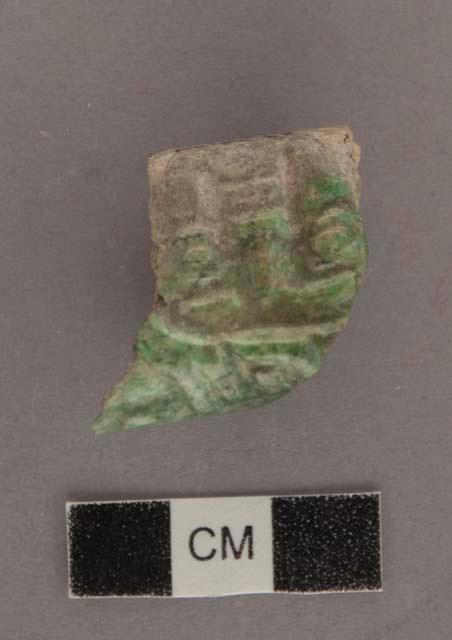 Fragment of jade flat relief human head - 25.6x29, 15.3 mm.