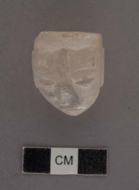 Ground stone; effigy; form of human face