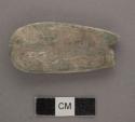 Ground stone; ornament; pendant; portion missing at perforation