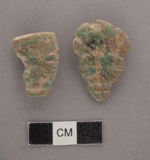 Ground stone; ornament; pendant; incised, both sides