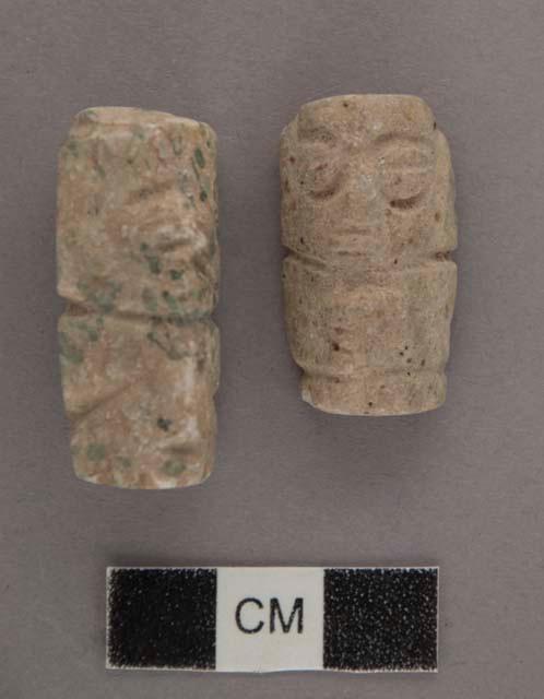 Ground stone; 2 effigy figures, incised