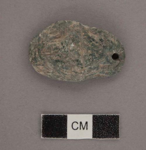 Gound stone; ornament; pendant