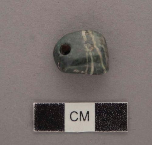 Gound stone; ornament; pendant