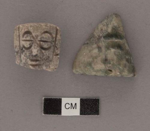 Ground stone effigies and pendants; incised; some perforated