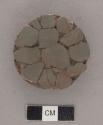 Pyrite mosaic on stone plaque, pierced for suspension