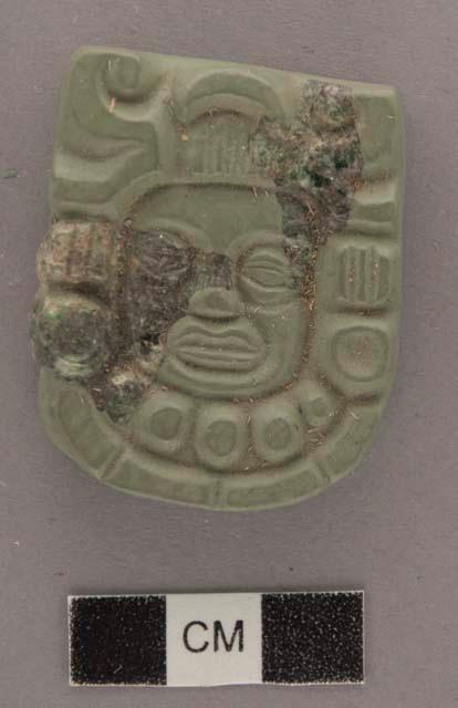 Fragment of jade flat relief human head -21x21x10.4 mm.